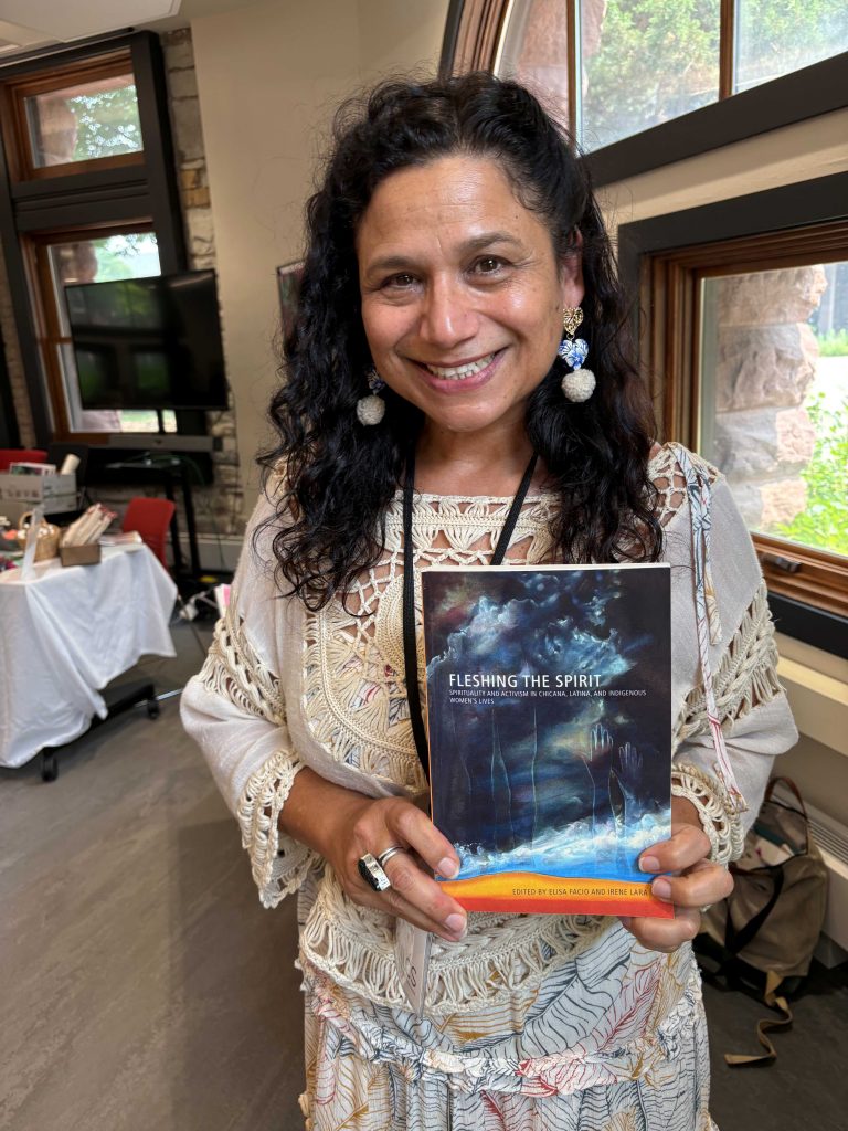 Authors and editors Aída Hurtado, Irene Lara, and Vanessa Fonseca-Chávez gather at the University of Arizona Press booth during the 2026 MALCS Summer Institute