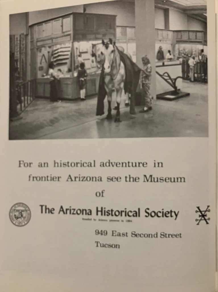 photo from 1972 of the inside of the Arizona Historical Society with display cases

