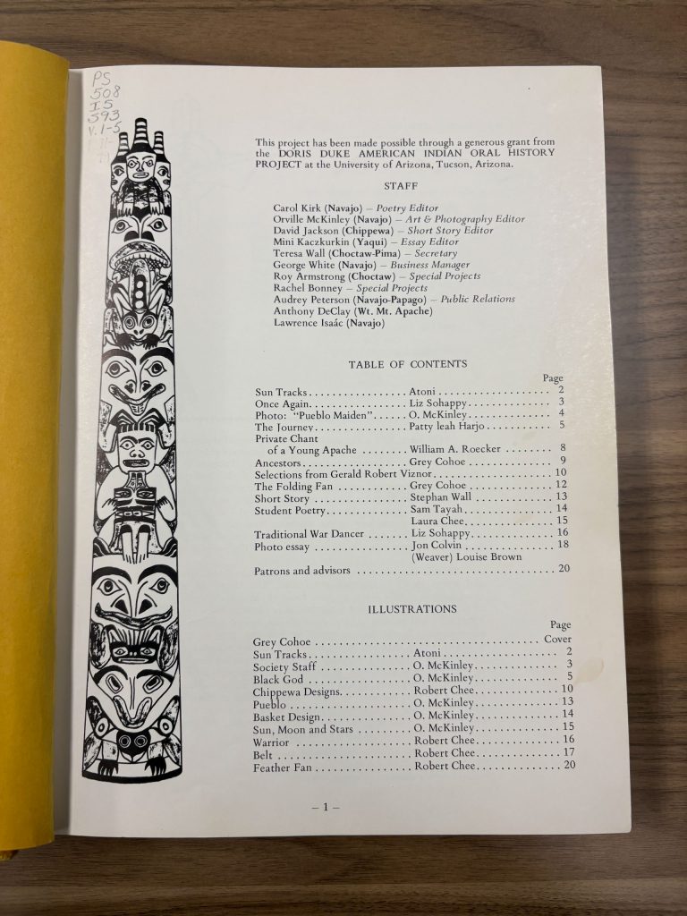 Table of contents page from Sun Tracks showing staff listings and a vertical Indigenous illustrated totem design along the left margin.